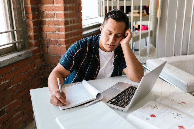 Man-Sleeping-At-Work