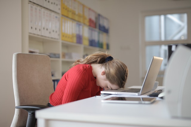 Woman-Sleeping-At-Work